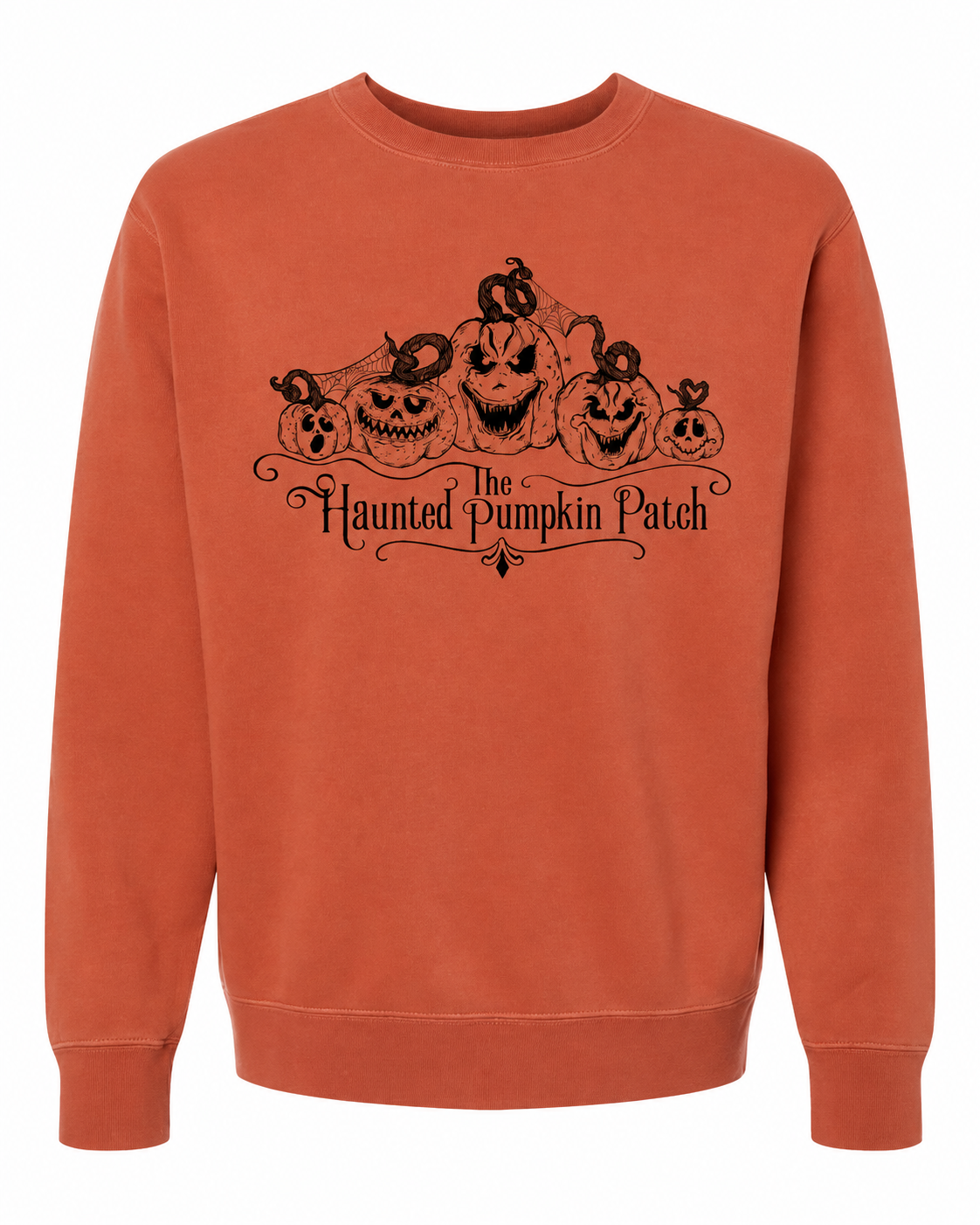 Original crewneck in Pigment Amber for sizes Large and 2XL — black Haunted Pumpkin Patch pumpkins artwork centered on front