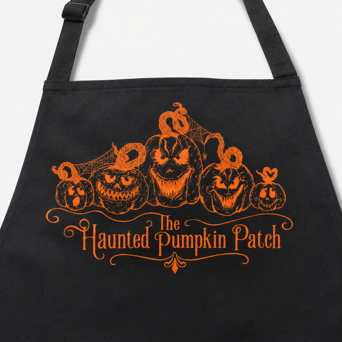 The Haunted Pumpkin Patch Artisan Apron — Lights Out Black