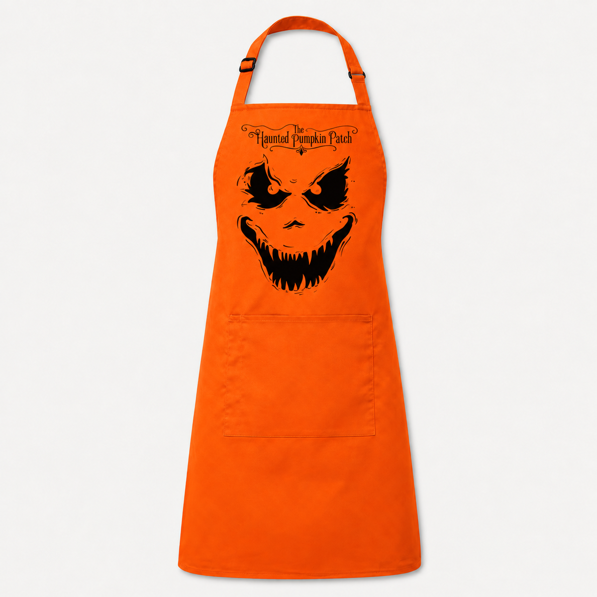 Orange scary apron with black face and Haunted Pumpkin Patch wording above