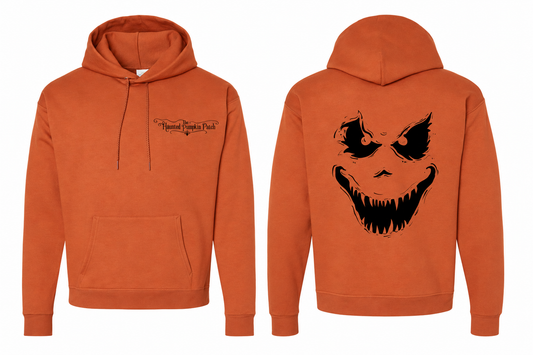 The Haunted Pumpkin Patch Scary Hoodie — Texas Orange front and back